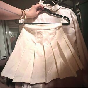 ARITZIA: Sunday Best Cream Tennis Skirt
